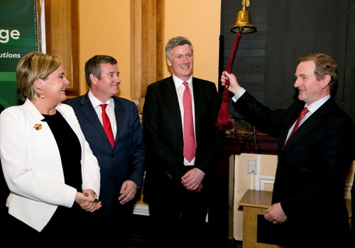 An Taoiseach, Enda Kenny TD, rings the bell at the launch of the Malin IPO at the Irish Stock Exchange, watched on by (L-R) Deirdre Somers, CEO, ISE, and John Given and Dr Adrian Howd from Malin