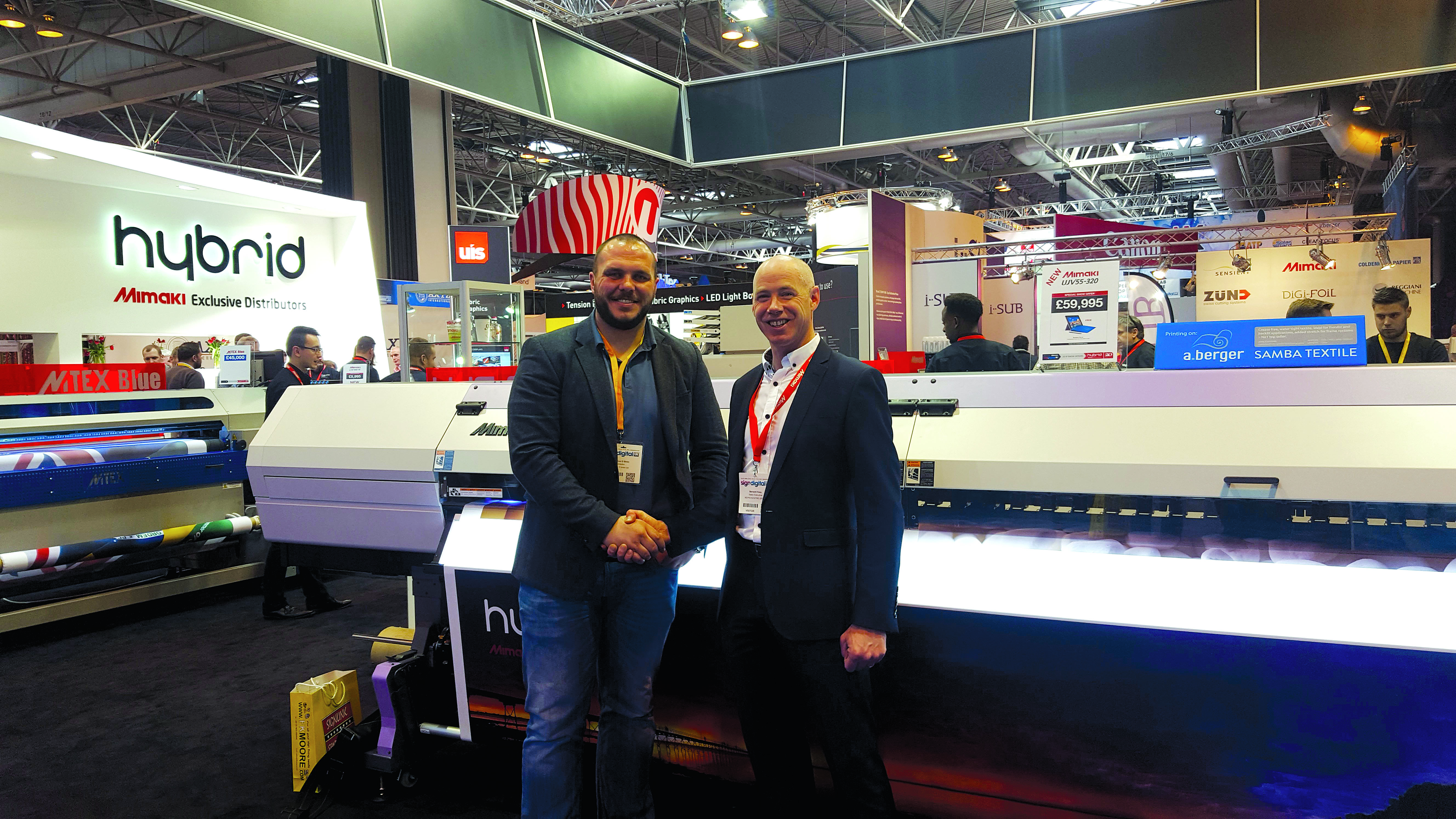 Andrew O'Brien of W.C. O'Brien and Bernard Hoey of Reprocentre with the Mimaki UJV55-320