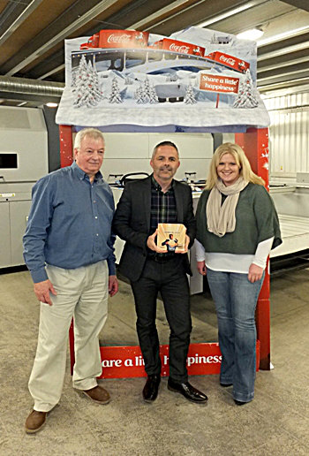 L to R: Chris O’Brien - Structural Engineer, Tony Roe – Managing Director (with FESPA award in hand), Gillian Barry – Senior Graphic Designer and Durst 1030 in background