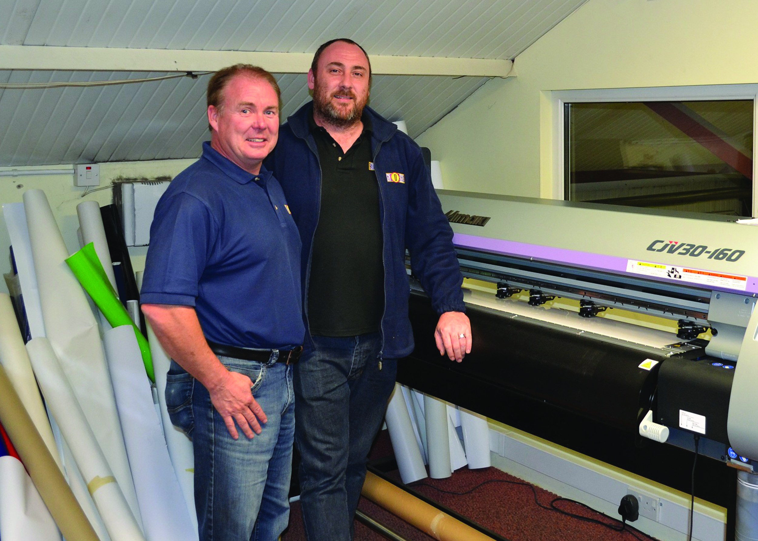 Sign D Sign’s Albert Watson and Glenn MacPherson with the company’s new Mimaki CJV30